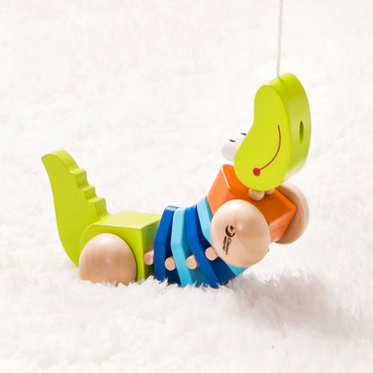 detalle cabeza y ojos del arrastre cocodrilo de madera Classic World