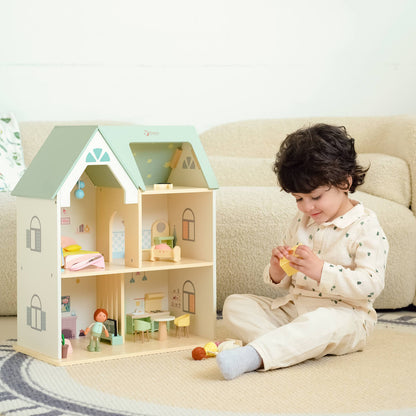 Niño jugando con los muebles de juguete de la Casa de muñecas Cottage de Classic World