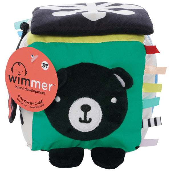 Packaging del Cubo de descubrimiento sensorial Wimmer de la marca Manhattan Toy para bebés