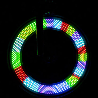Rueda de bicicleta con formas luminosas Brightz encendidas mostrando distintos patrones de color