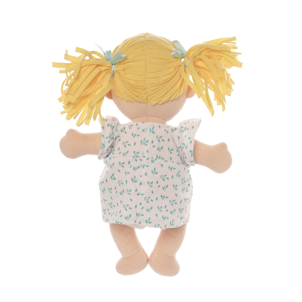 vista trasera del set muñeca Peach Love Stella con coletas rubias vestido y pañal Manhattan Toy
