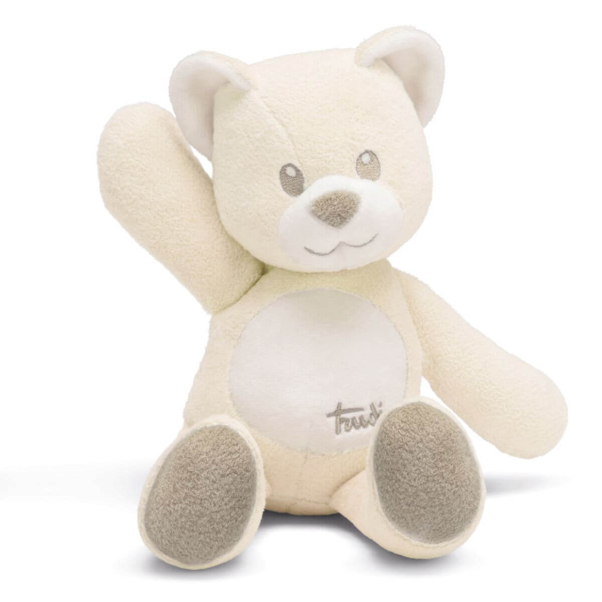Detalle del bordado facial del peluche oso Trudi en color marfil para recién nacidos
