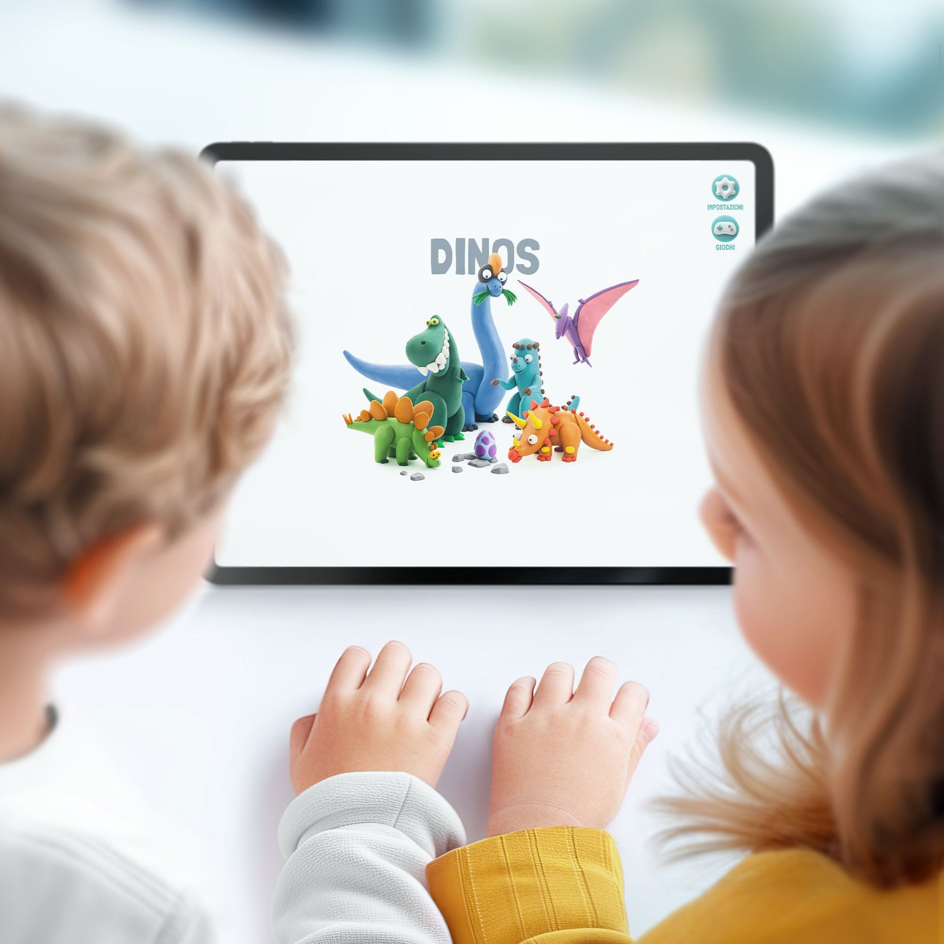 niños modelando plastilina Hey Clay triceratops con app en tableta