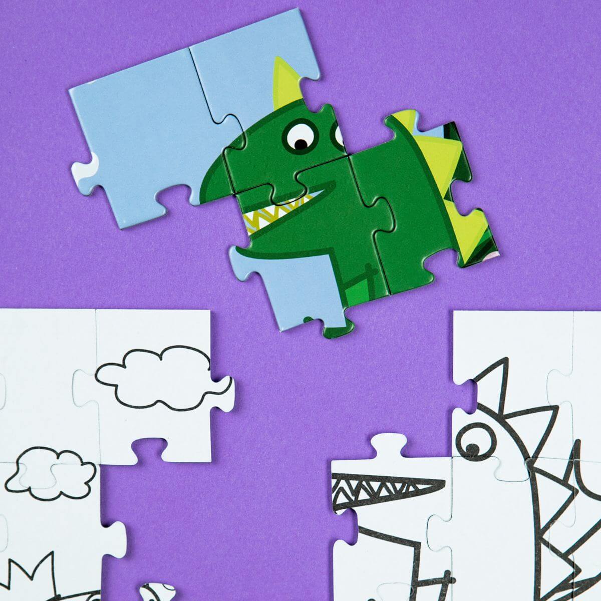 detalle de piezas a color y en blanco y negro del Puzzle 2 en 1 para colorear Peppa Pig Banquete real 