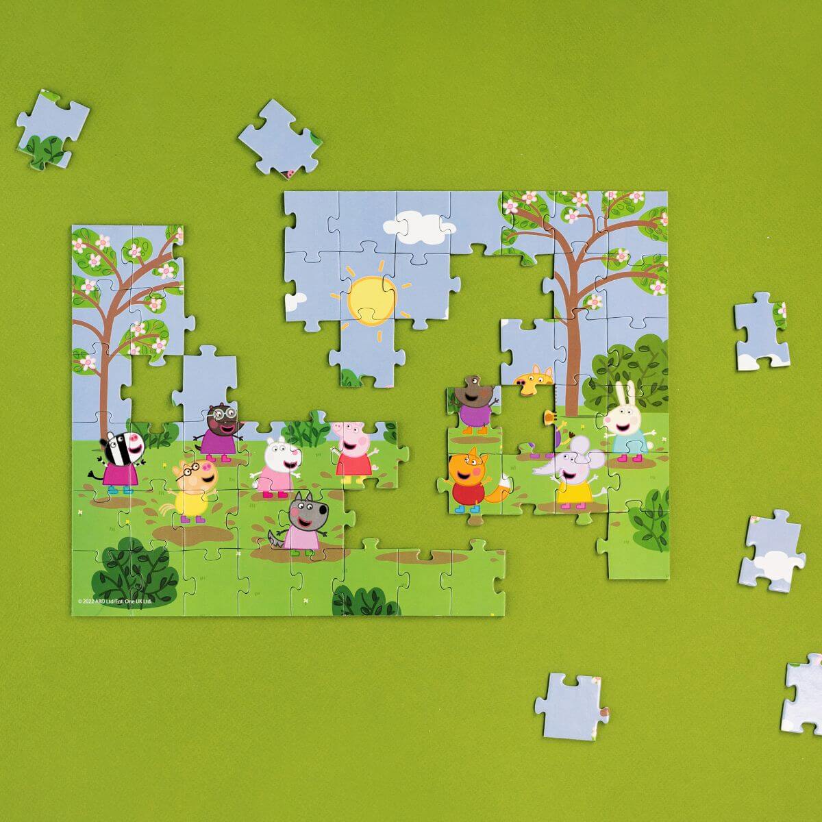 Puzzle Peppa Pig Amigos saltando en el barro de 60 piezas para niños a partir de 4 años de la marca Dodo