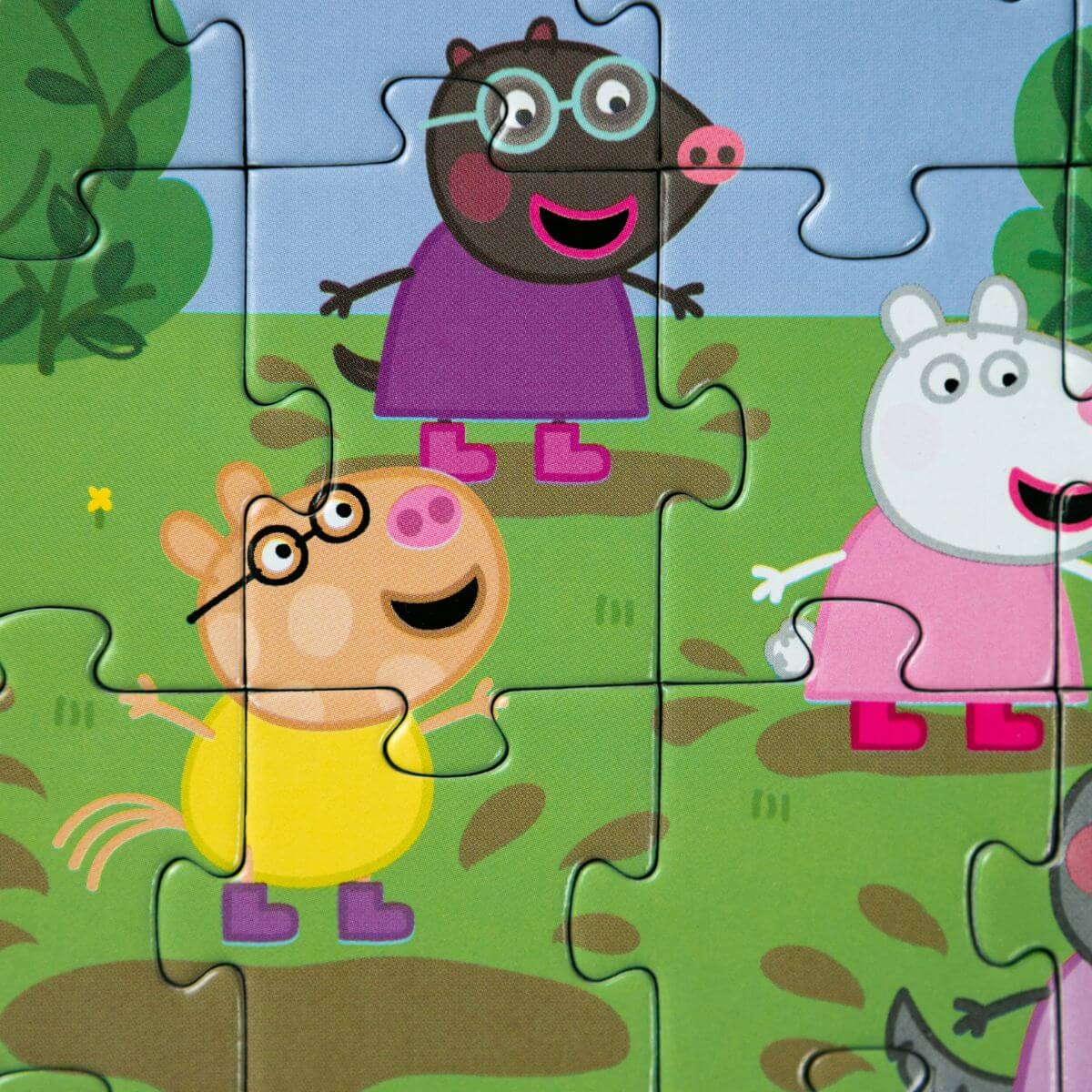 Detalle de las piezas del Puzzle Peppa Pig Amigos saltando en el barro de 60 piezas para niños a partir de 4 años de Dodo