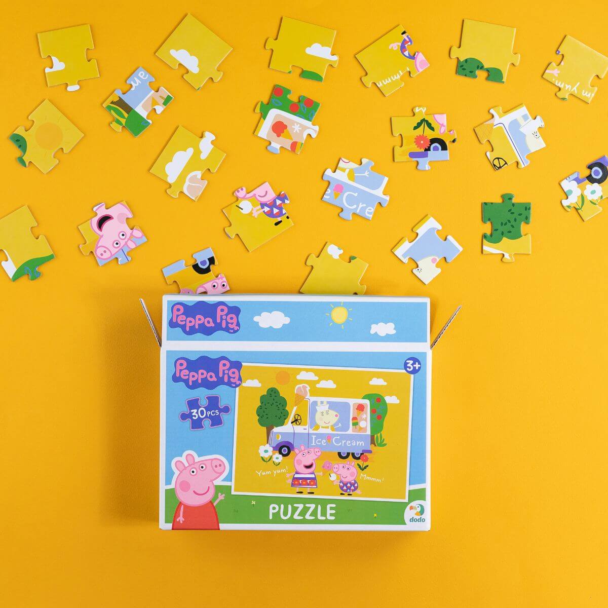 Piezas saliendo de la caja del Puzzle Peppa Pig Helados (30 piezas) de Dodo