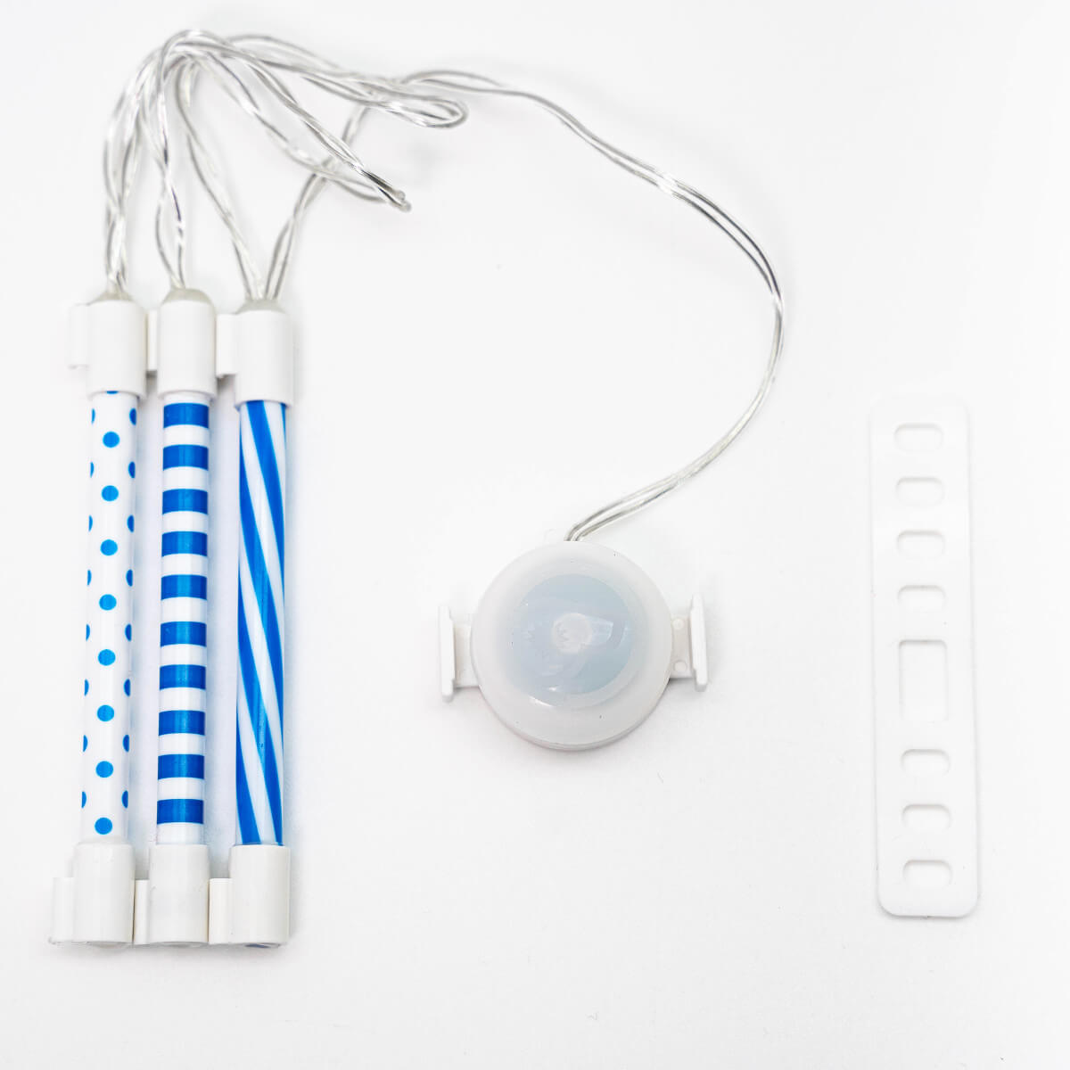 Contenido del pack de tubos luminosos Brightz azul: tubos LED, correa de silicona y clip